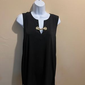 Tunic top, black w/gold logo grommets. Sleeveless